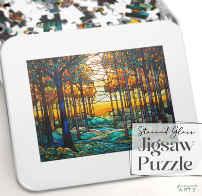 A Stained Glass Rainbow Forest Jigsaw Puzzle gift shows tall trees, bright orange leaves, and a sunlit background. Crafted from high-quality chipboard, its partially assembled in a white box labeled with the products name.