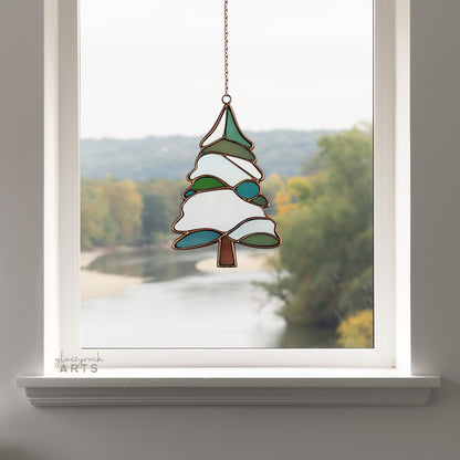 A picture of a snowy tree stained glass pattern from GlassyRock Arts.