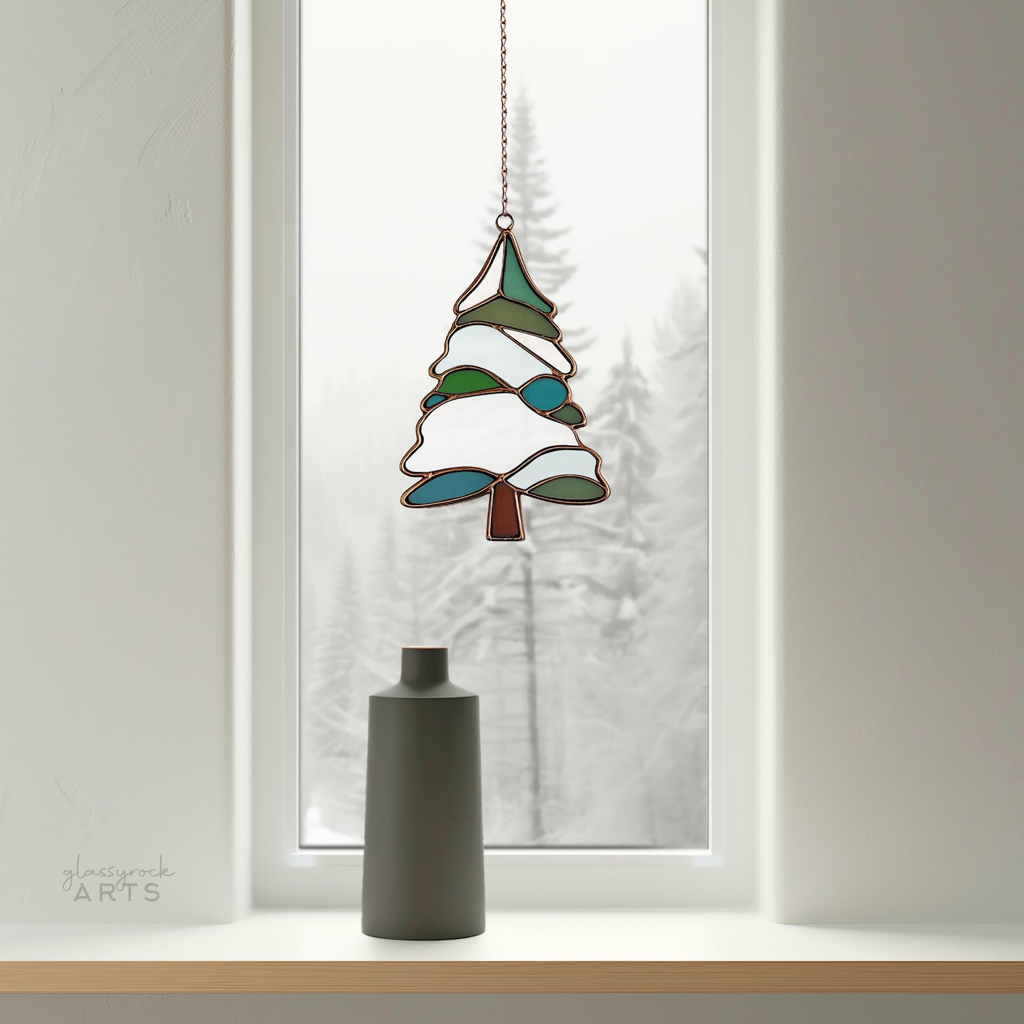 A picture of a snowy tree stained glass pattern from GlassyRock Arts.