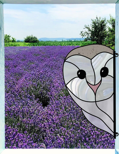 A Snowy Owl Stained Glass Pattern adorns the windows edge, overlooking a vast lavender field with blue skies and distant hills, ideal for those seeking a digital pattern download for personal use or commercial license.