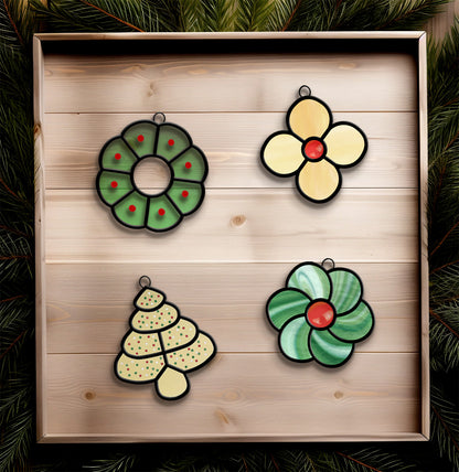 A picture of the Stained Glass Christmas Cookie Ornament Patterns 4 Pack from GlassyRock Arts. 