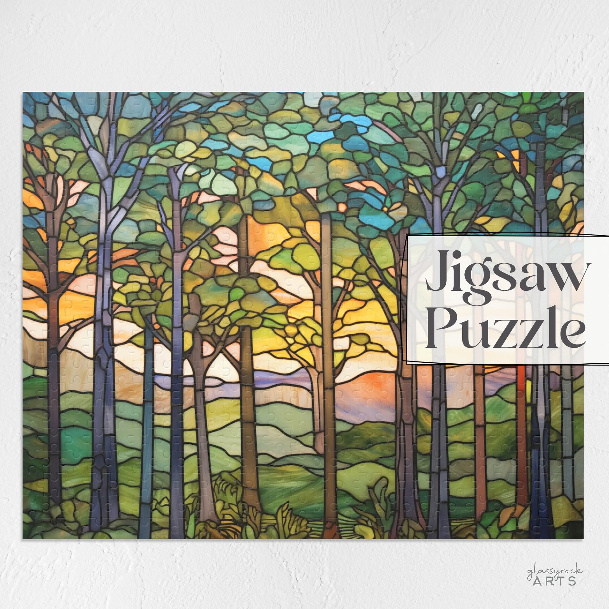 A colorful image of a stained glass-inspired forest jigsaw puzzle with green trees and hills and blue sky.