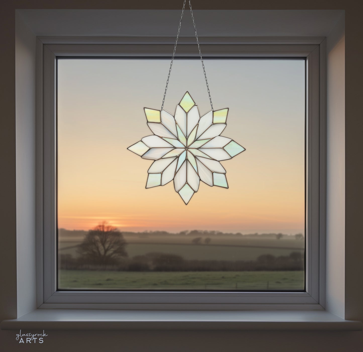 A picture of a sweet snowflake stained glass pattern from GlassyRock Arts.