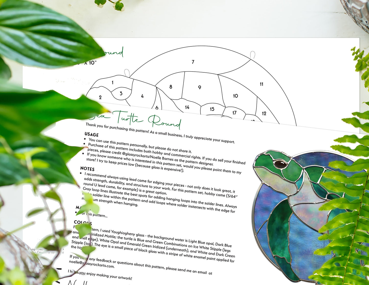 The Round Stained Glass Turtle Pattern showcases a sea turtle amidst green foliage, with instructions and numbered sections. A completed green and blue sun catcher elegantly rests atop these guidelines.