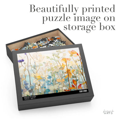 A partially assembled Wildflower Botanicals Jigsaw Puzzle in a black box displays pastel-hued flowers. The lid sits aside, showcasing the stained glass-inspired finished design with Beautifully printed puzzle image on storage box text.