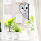 Animal stained glass patterns, snowy owl, instant pdf downloads, one of four patterns in the pack, shown in a window
