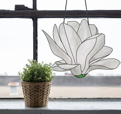 Stained glass pattern for a giant white snowdrop flower, instant PDF download, shown hanging in a window with a plant