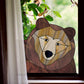 Stained glass pattern for a bear peeking in the window, instant PDF download, shown in a window with ivy