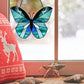 Beginner stained glass pattern for a butterfly, instant PDF download, shown hanging in a window with Christmas decorations