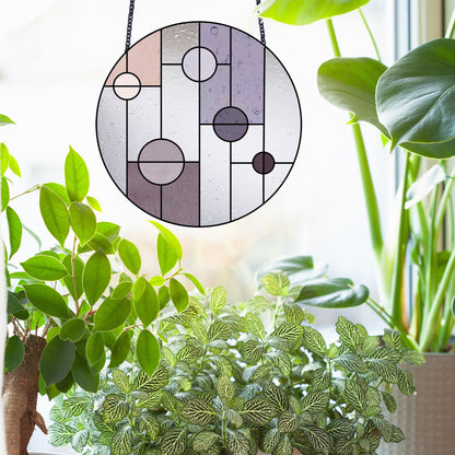 Geometric circular stained glass pattern, instant pdf download, shown in a window with sun and plants