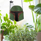 Boba Fett Star Wars stained glass pattern, instant pdf download, shown in window with plants