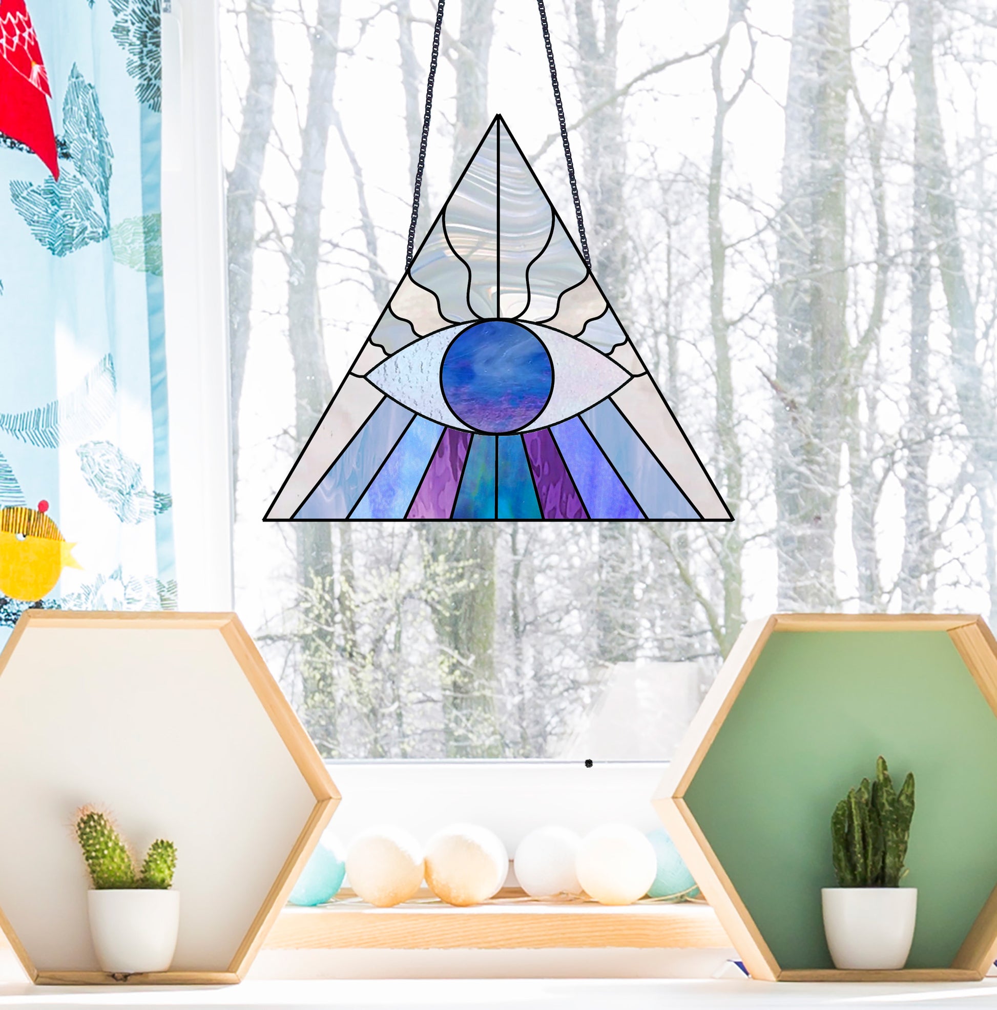 Original evil eye boho triangle stained glass pattern, instant PDF download, shown in a winter window
