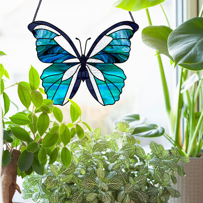 Butterfly stained glass pattern, instant PDF download, shown in bright window with plants