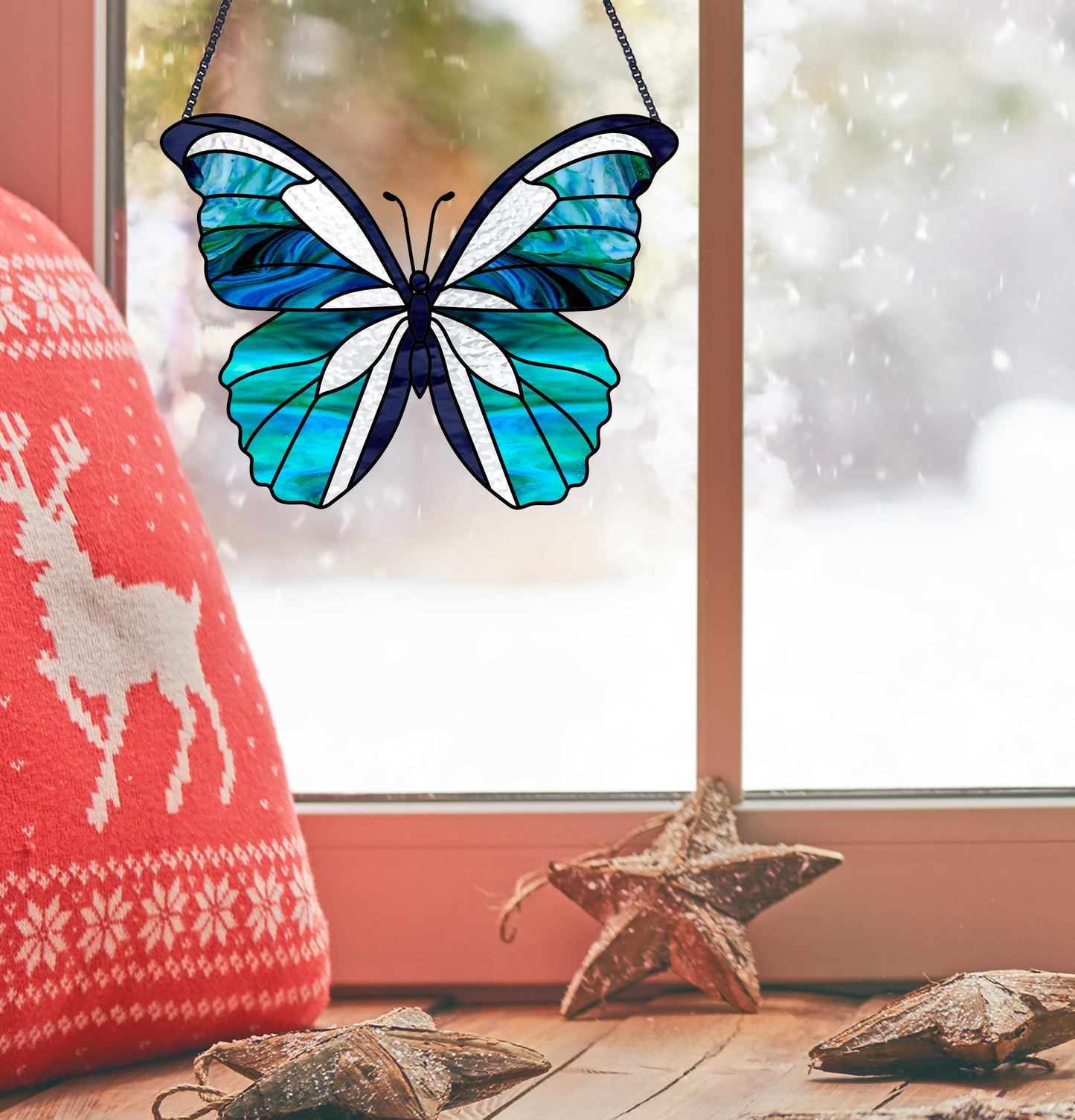 Butterfly stained glass pattern, instant PDF download, shown in bright window with Christmas decorations