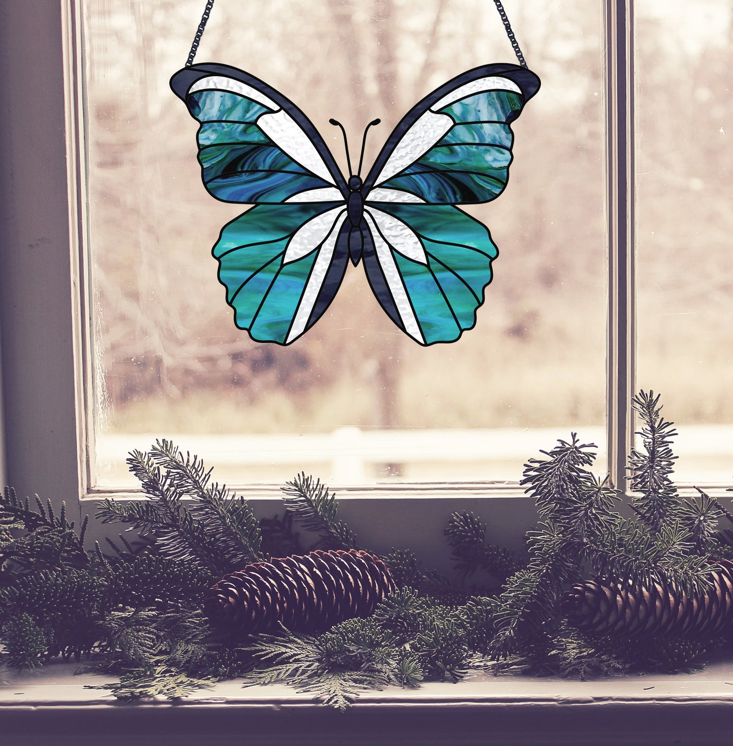 Butterfly stained glass pattern, instant PDF download, shown in window with pine cones