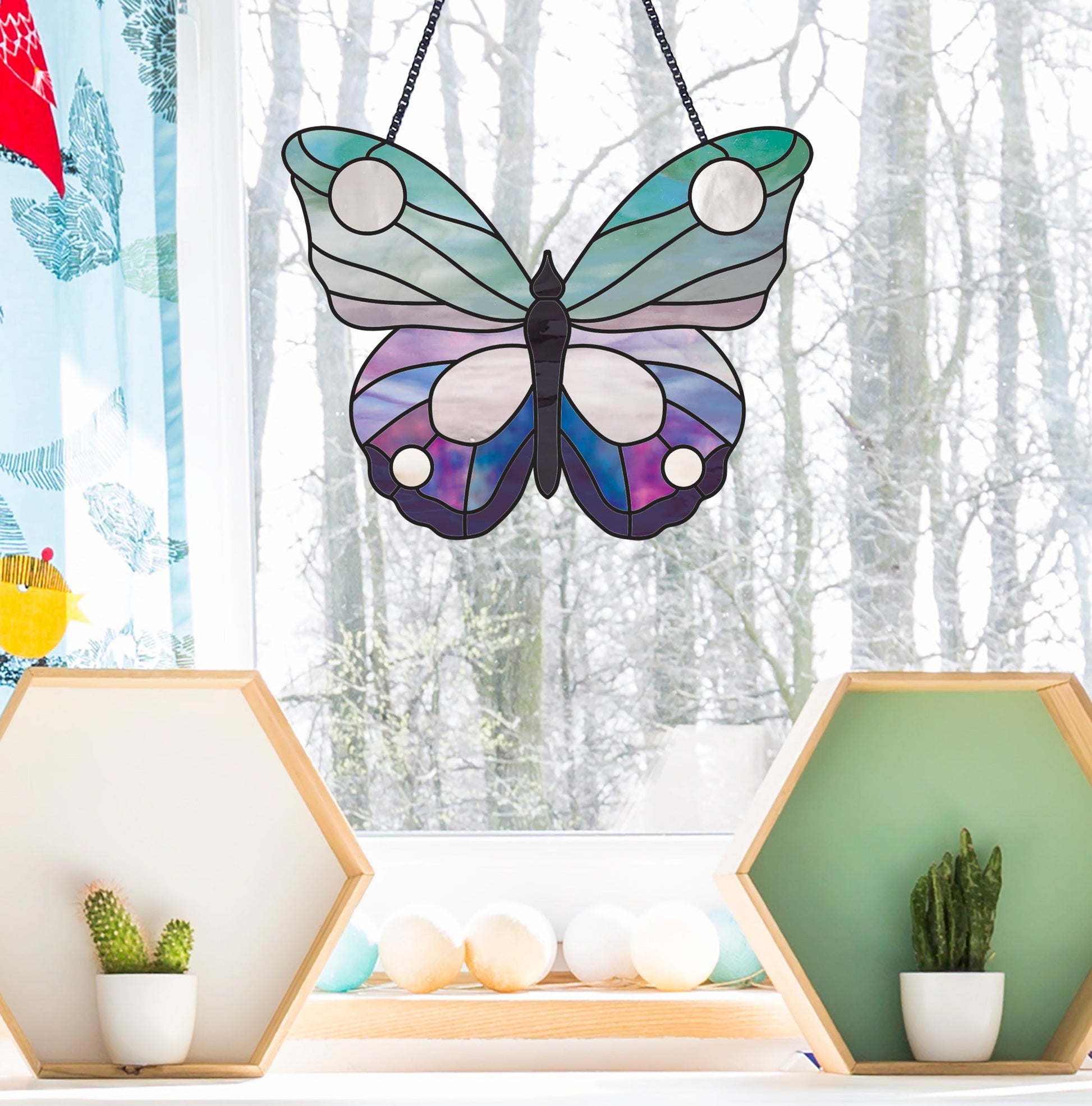 Butterfly stained glass patterns, pack of five, instant download, one butterfly shown in window with snowy background