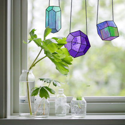 A picture of the Geometric Gems Beginner Stained Glass Patterns Pack of 4 from GlassyRock Arts.