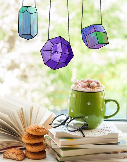 A picture of the Geometric Gems Beginner Stained Glass Patterns Pack of 4 from GlassyRock Arts. 