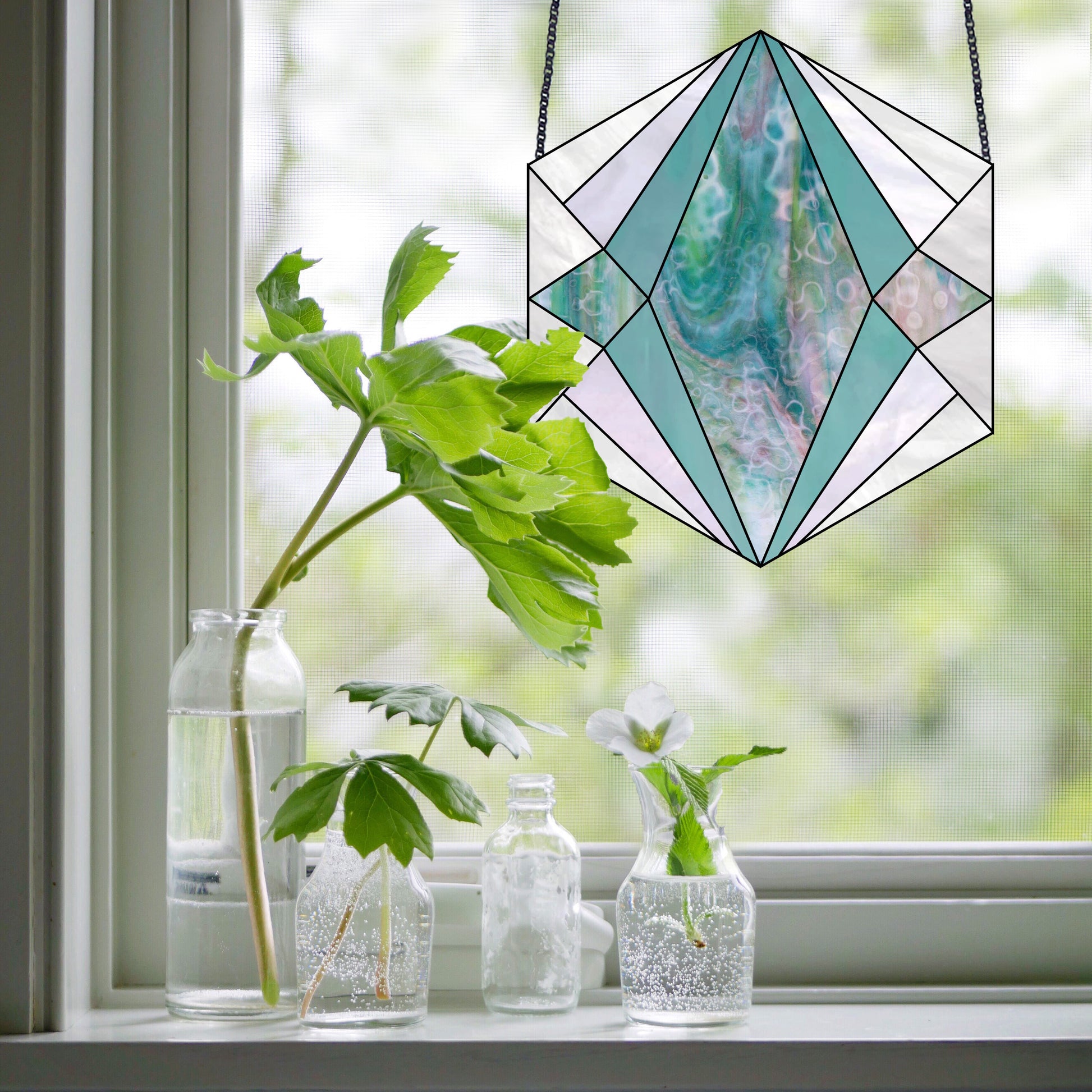 Beginner stained glass pattern for a boho geometric hexagon, instant PDF download, hanging in a window with plants