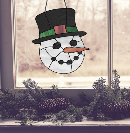 charcoal smile snowman christmas stained glass pattern, instant pdf download, shown in window with pine cones