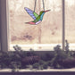 hummingbird stained glass pattern, instant pdf, shown in window with pine cones