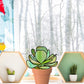 Original stained glass pattern for a kalanchoe "paddle plant" succulent plant stem agave, instant PDF download, shown on windowsill with winter background