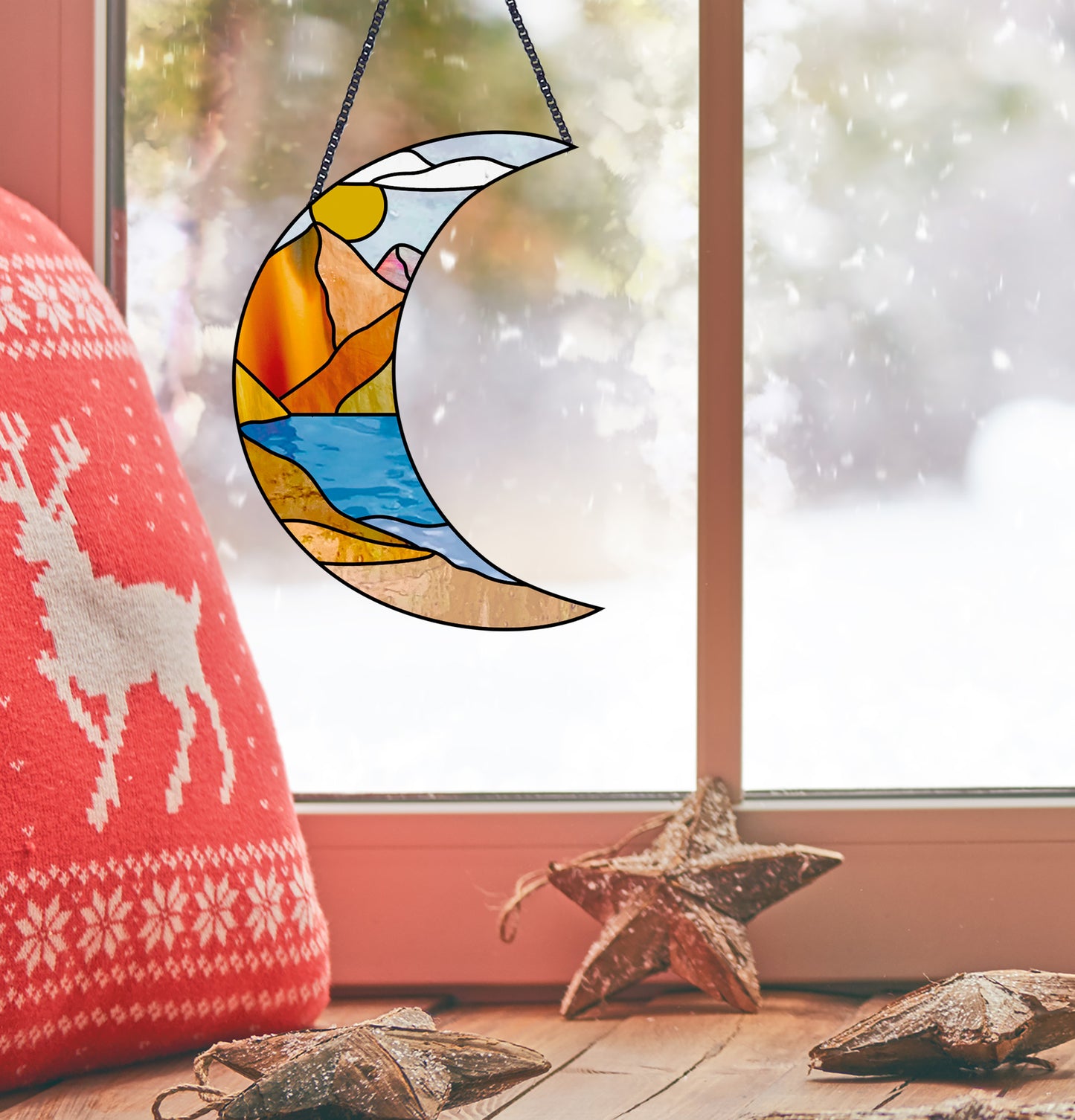 Stained glass pattern for a boho landscape crescent moon, instant PDF download, shown in a window with Christmas decorations