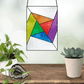 Beginner stained glass pattern of an abstract rainbow pinwheel, instant PDF download, shown hanging in a window with plants