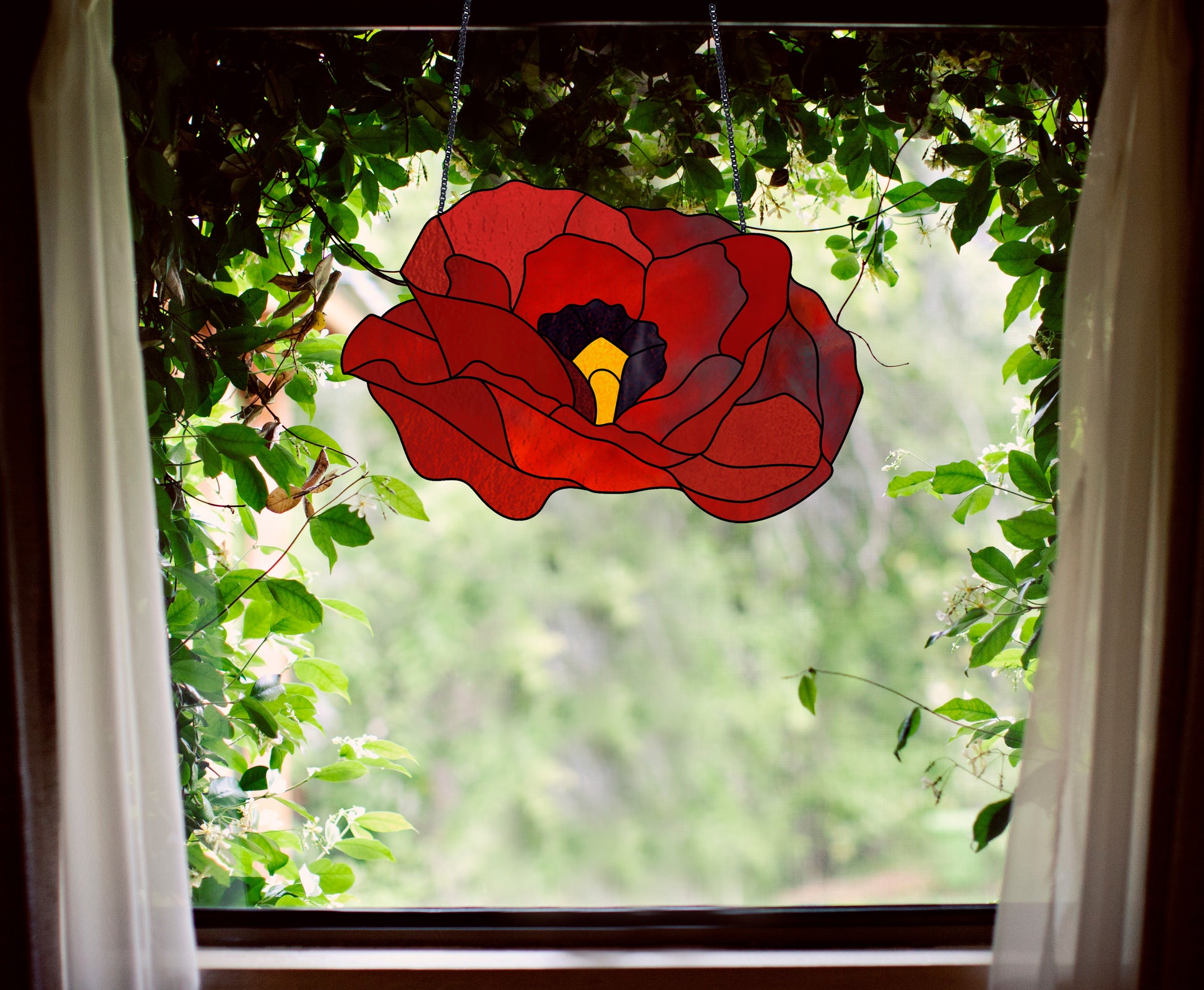 red poppy stained glass pattern, instant pdf download, shown hanging in a window with ivy