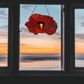 red poppy stained glass pattern, instant pdf download, shown hanging in a window with a sunset