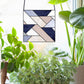 Square Geometric stained glass pattern, instant PDF download, shown in a bright window with plants