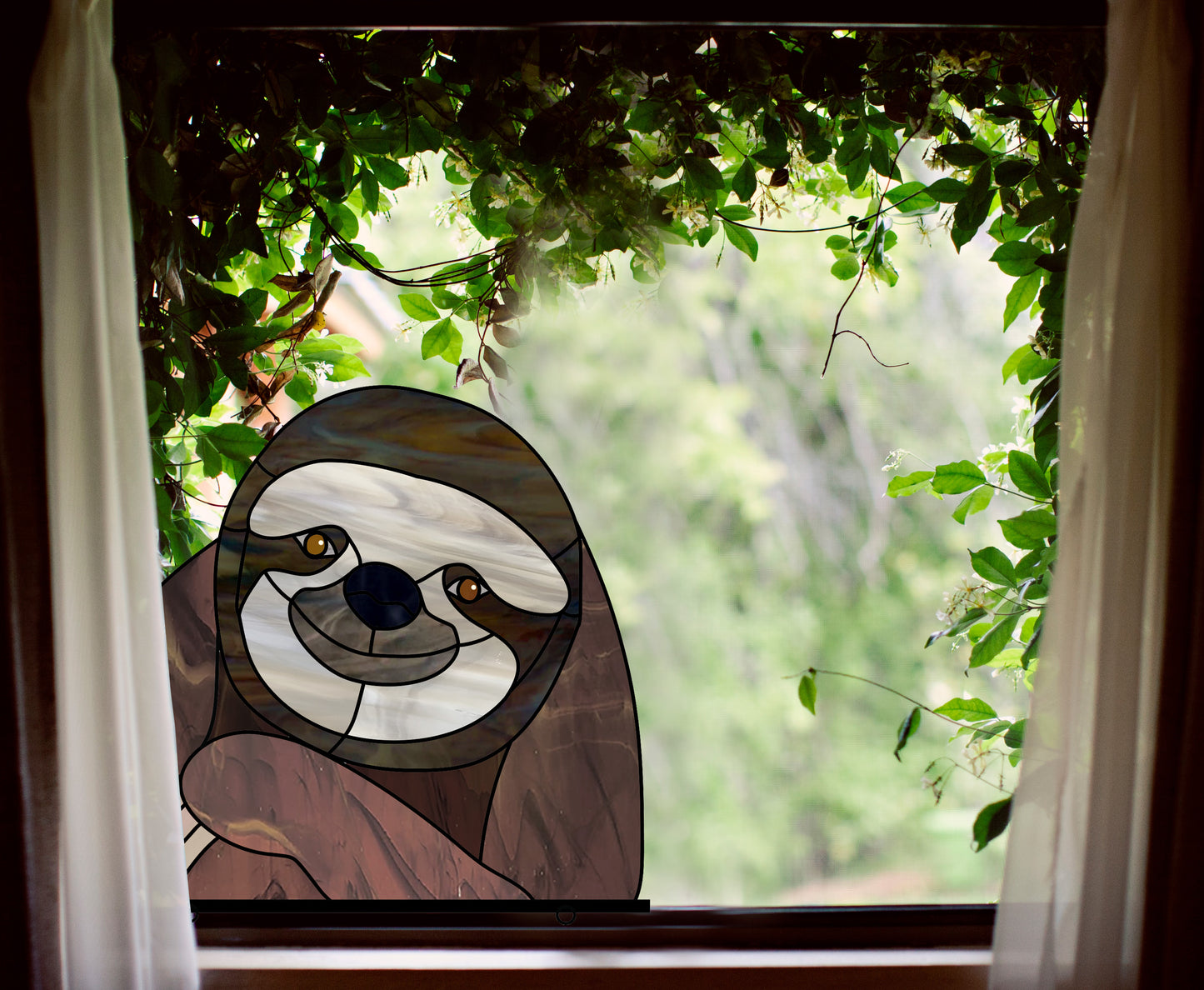 Stained glass pattern for a sloth peeking in the window, instant PDF download, shown in a window with ivy