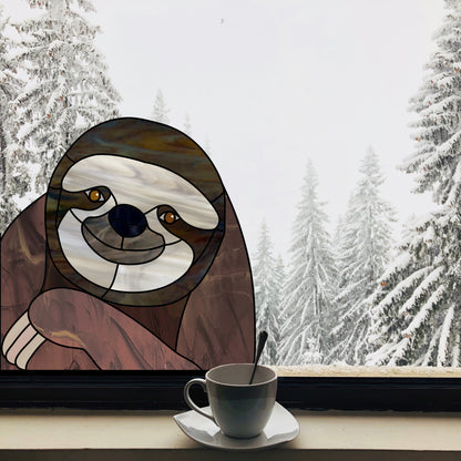 Stained glass pattern for a sloth peeking in the window, instant PDF download, shown in a winter window with tea