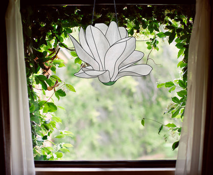 Stained glass pattern for a giant white snowdrop flower, instant PDF download, shown hanging in a window with ivy