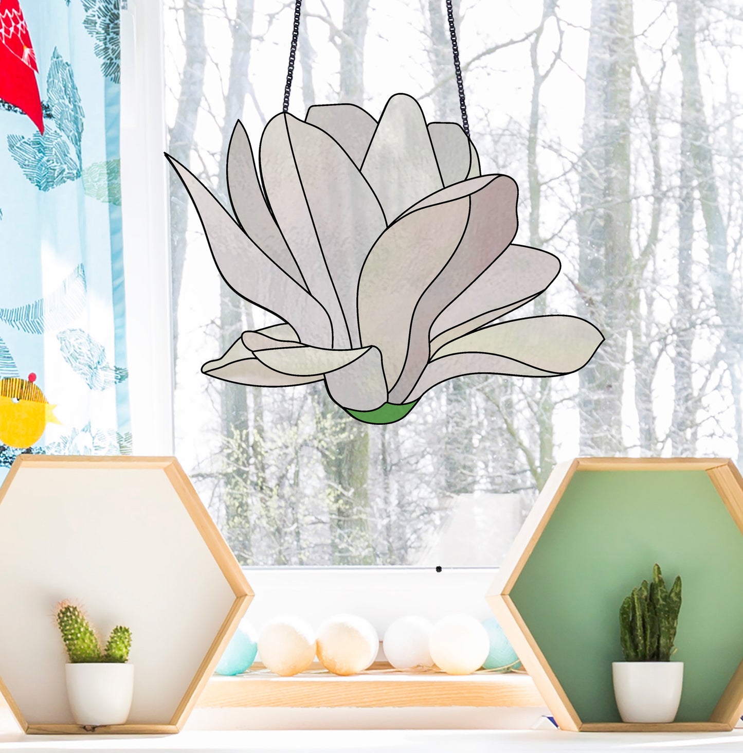 Stained glass pattern for a giant white snowdrop flower, instant PDF download, shown hanging in a window with a snowy background