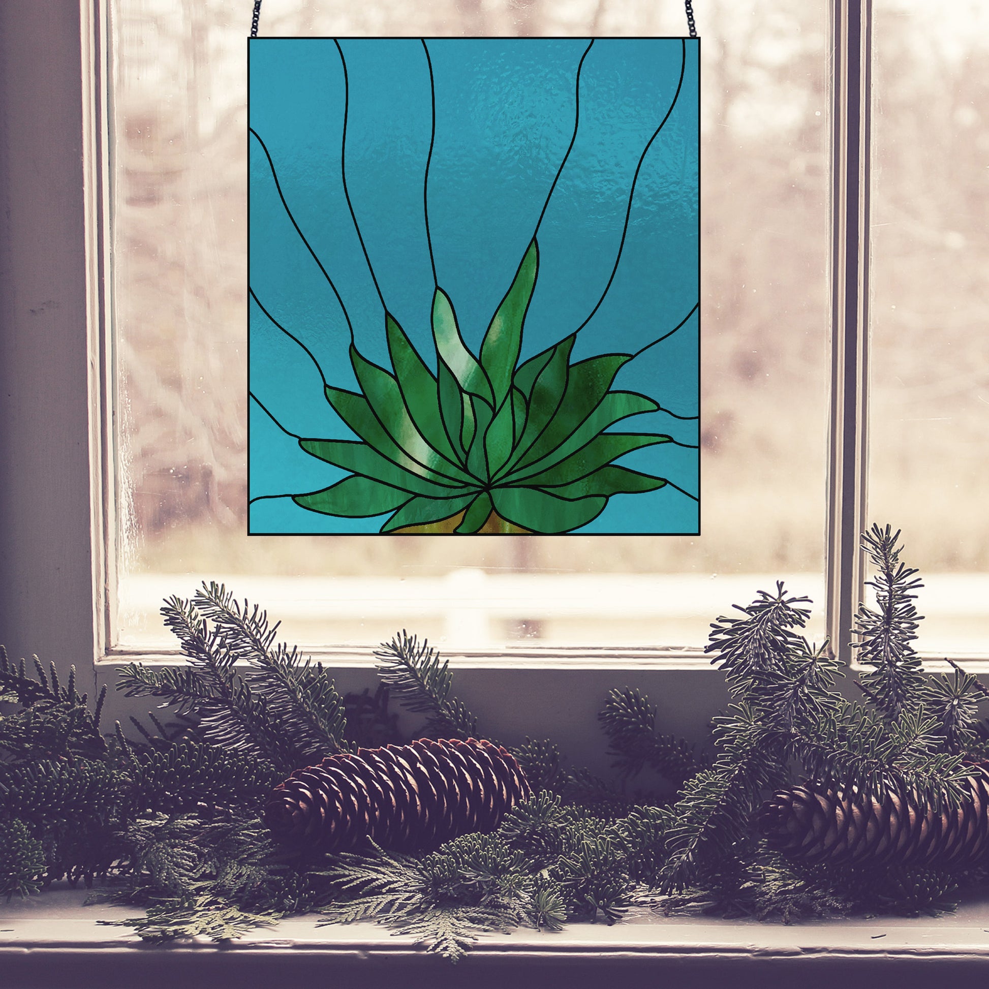 gasteria succulent panel stained glass pattern, instant pdf, shown in window with pine cones