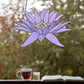 Stained glass pattern for a giant purple water lily flower, instant PDF download, shown hanging in a window with tea and a book
